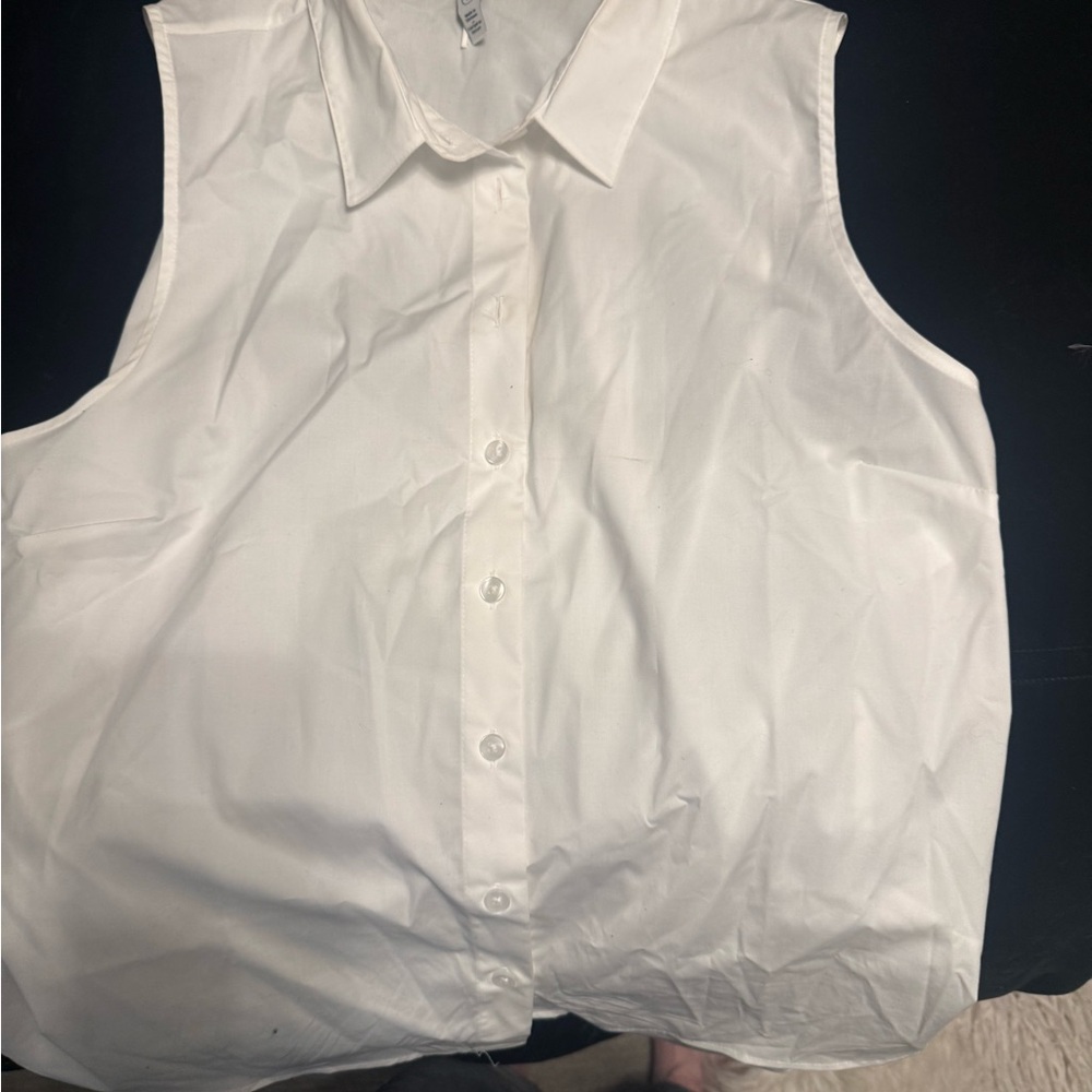 Sleeveless White Button-Up Blouse